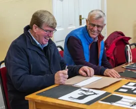 TLASOI two men laughing Brian Cregan